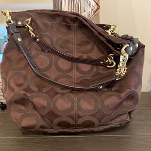 Coach purse brown. NEVER BEEN USED.